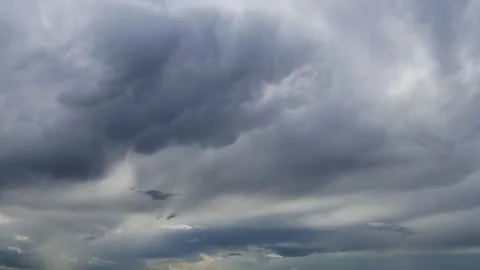 Timelapse of beautiful dramatic rainy clouds Stock Footage 281649135
