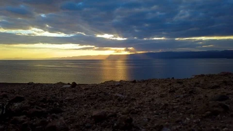 Timelapse. Beautiful evening sunset on the background of the sea and mountains. Stock Footage 123601556