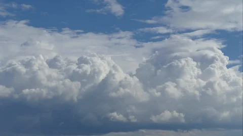 Timelapse with beautiful large cumulus clouds change shape Stock Footage 97589731