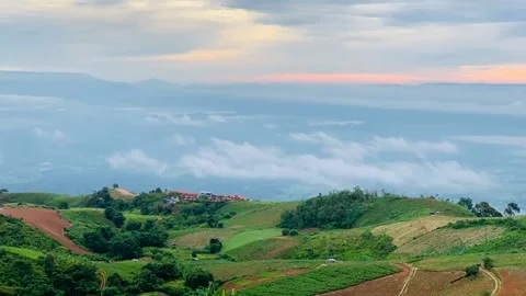 Timelapse of beautiful mountain view with moving clouds. Stock Footage 163780198