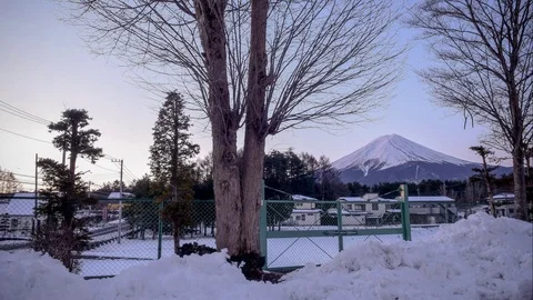 Timelapse of beautiful sunrise over mount Fuji with snow in Yamanashi, Japan. Stock Footage 76616152