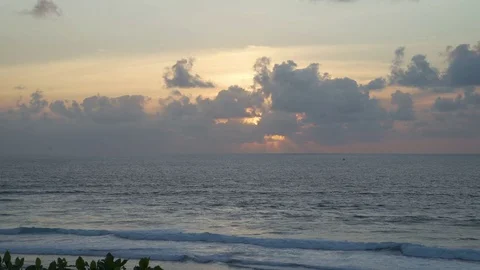 Timelapse Beautiful sunset at beach, light beam shining through cloudscape Bali Stock Footage 83717043