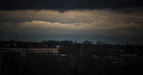 Timelapse of a beautiful sunset with clouds backlit by the sun Stock-Footage 129567753