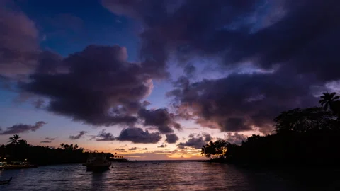 Timelapse - Beautiful sunset clouds over the ocean with sailboats in Hawaii Stock Footage 234835515