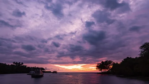 Timelapse - Beautiful sunset clouds over the ocean with sailboats in Hawaii Stock Footage 234836361