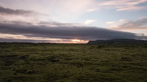 Timelapse of beautiful sunset with iconic moss covered landscape Stock Footage 83699511