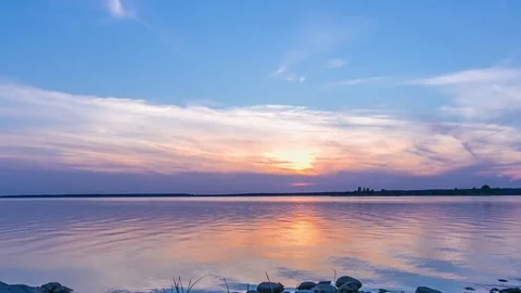 Timelapse of a beautiful sunset on a lake. Stock Footage 78125383