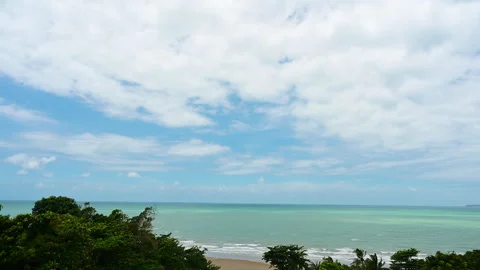 Timelapse of the beautiful view at the island beach with ocean waves and clouds. Stock Footage 248945876