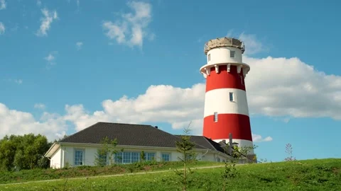 Timelapse. Beautiful view of the lighthouse in the blue sky Stock Footage 143154574