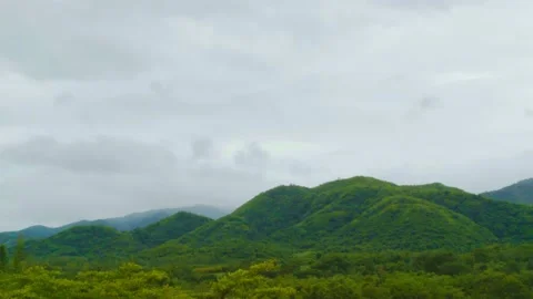 Timelapse Beautiful view of a mountain view with moving clouds Stock Footage 234710953
