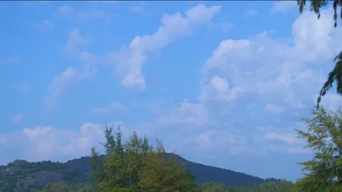 Timelapse Beautiful view of a mountain view with moving clouds Stock Footage 260289103