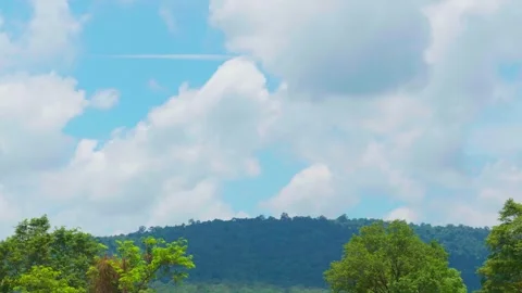 Timelapse Beautiful view of a mountain view with moving clouds Stock Footage 282567336