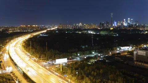 Timelapse Beijing Downtown Traffic Stream at Night with Skyscrapers,China Stock Footage 117892014