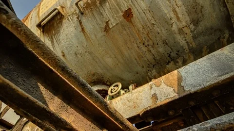 Timelapse Beneath Old Rusty Railroad Train Car [4K] Stock Footage 83882031