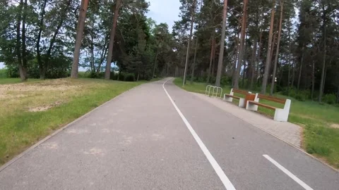 Timelapse of a Bicycle Ride Through Forest and Suburban City Stock Footage 292284838