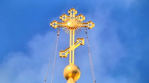 Timelapse of a big cross standing against the sunny blue sky and flying clouds Stock Footage 47425108