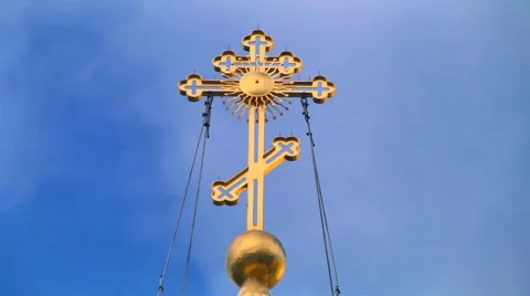Timelapse of a big cross standing against the sunny blue sky and flying clouds Stock Footage 47425112