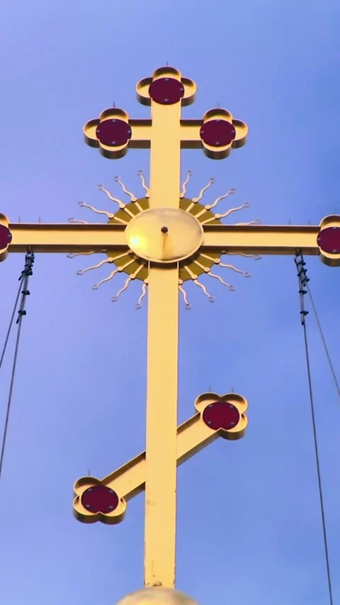 Timelapse of a big cross standing against the sunny blue sky and flying clouds 스톡 동영상 249244228