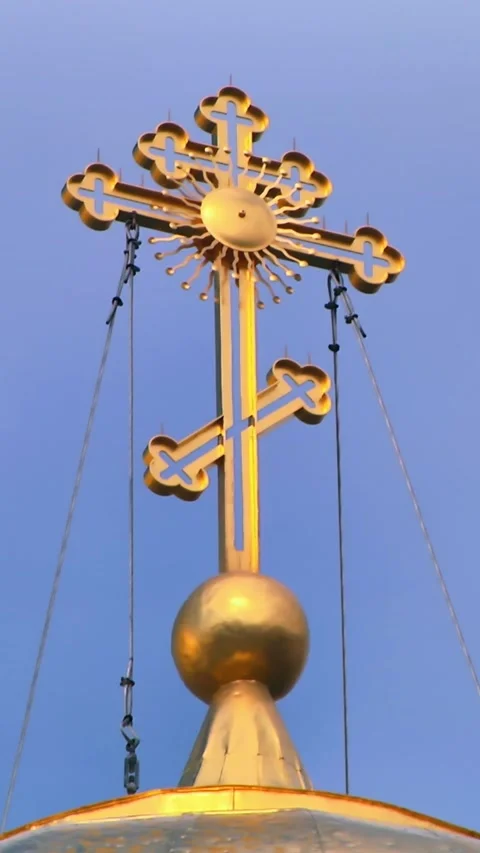 Timelapse of a big cross standing against the sunny blue sky and flying clouds Stock Footage 249247624