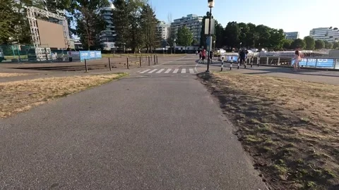 Timelapse of bike riding through Olympic Village Stock Footage 244598161