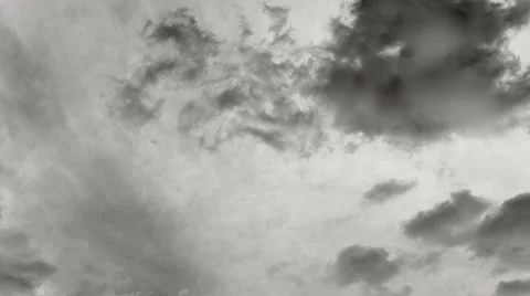 Timelapse - black clouds moving in two directions - black and white - 4k Stock Footage 50768737