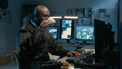 Timelapse of Black Male Security Guard in Office Stock Footage 330610258