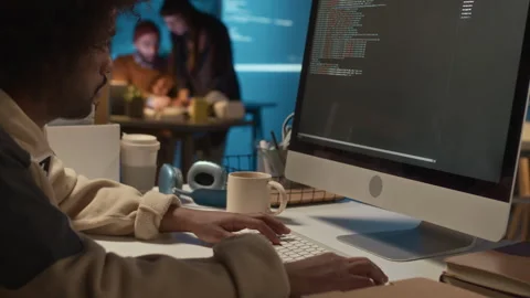 Timelapse of Black Male Software Developer Writing Code for New System Stock Footage 279623293