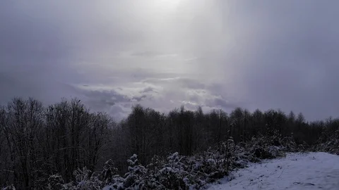 Timelapse of blizzard with fog and clouds in the background in the mountains Stock Footage 121491210