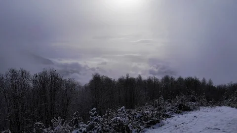 Timelapse of blizzard with fog and clouds in the background in the mountains Stock Footage 121492680