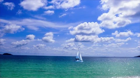 Timelapse Blue Sky and Cloudy over the ocean with sailing Stock Footage 42520157