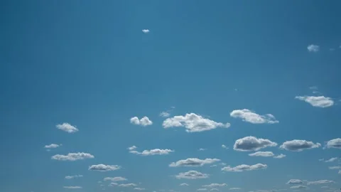 Timelapse of blue sky with clouds on bright sunny day for abstract background Stock Footage 243611264