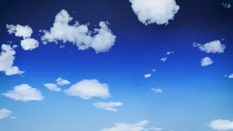 Timelapse of blue sky with fluffy clouds. Seamless loop Stock Footage 347206121