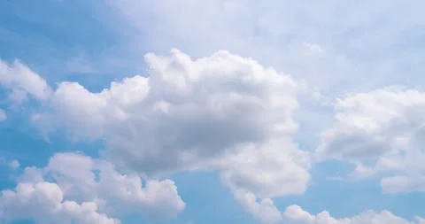 Timelapse Blue sky fluffy white clouds on summer season bright clear skyline Stock Footage 262501291