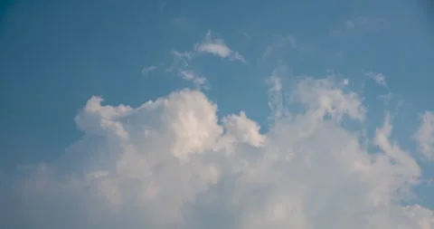 Timelapse Blue sky fluffy white clouds on summer season bright clear skyline Stock Footage 262502393