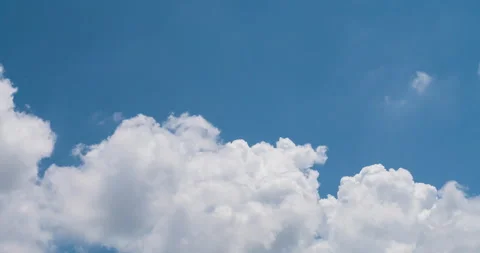Timelapse Blue sky fluffy white clouds on summer season bright clear sky 動画素材 267796766