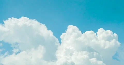 Timelapse Blue sky fluffy white clouds on summer season bright clear Stock Footage 276809860