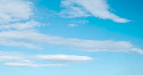 Timelapse Blue sky fluffy white clouds on summer season bright clear skyline Stock Footage 277311536