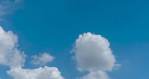 Timelapse Blue sky fluffy white clouds on summer season bright clear skyline Stock Footage 278570814