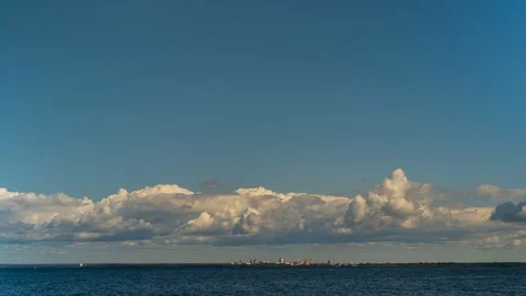 Timelapse in the blue sky over the Gulf of Finland flying clouds. Stock Footage 114978256