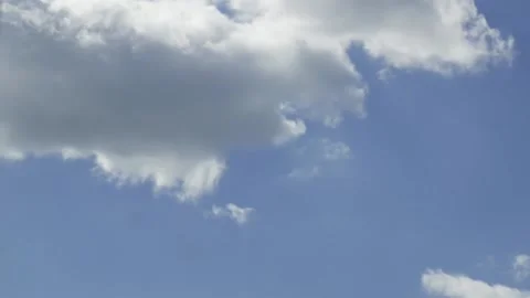 Timelapse of blue sky with white clouds Stock Footage 131154044
