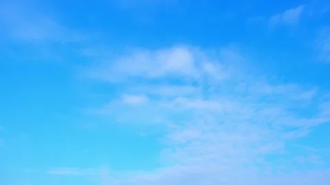Timelapse of the blue sky with white clouds, Time-lapse footage. Stock Footage 249730231