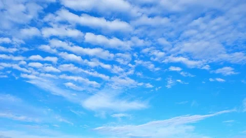 Timelapse of the blue sky with white clouds, Time-lapse footage. Stock Footage 249730387