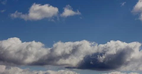 Timelapse: Blue sky white clouds. Nature background 4K Stock Photos