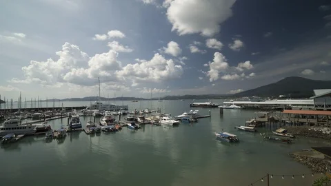 Timelapse of boats at a small harbour in Langkawi 4K HQ Stock Footage