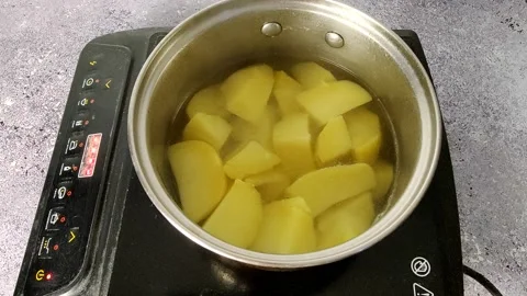 Timelapse of boiled potatoes in a pan Stock Footage 230015274