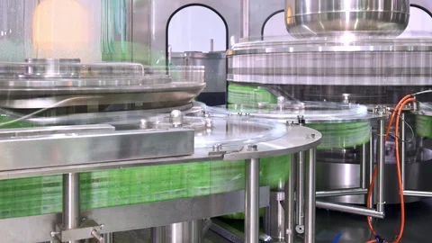 Timelapse of bottle packing machine in a small manufacturing facility. Stock Footage 92494125
