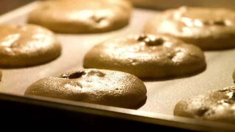 Timelapse of bread and cake dough baking in oven. Bakery rising in oven. Baki Stock Footage 272449996