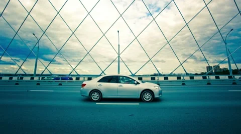 Timelapse of the Bridge with truss structure and bottom-mounted roadway with Stock Footage 56394198
