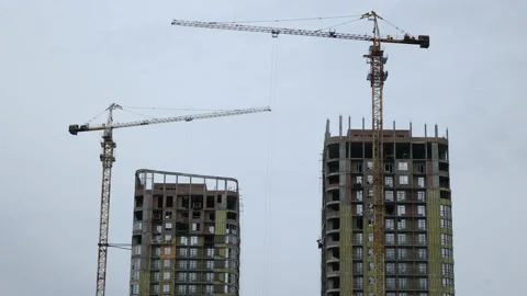 Timelapse building construction  city crane sky Stock Footage 176391735