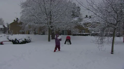 Timelapse of building a snowman Stock Footage 1106954